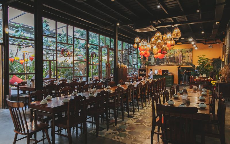 A warm Vietnamese restaurant space with a cozy and refined design